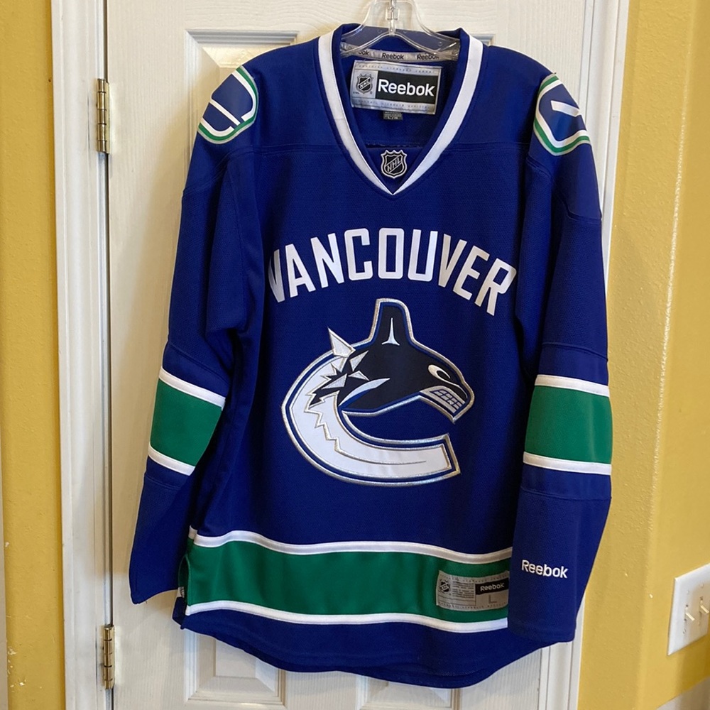 Reebok Vancouver Canucks Blue Green V-Neck Hockey Sweater
